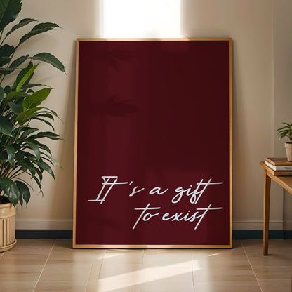 Olivia Dean It's a Gift To Exist print displayed in wooden frame on wall - music typography art