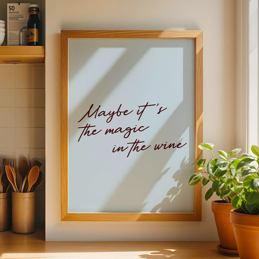 Olivia Dean Maybe It's The Magic In The Wine print displayed in wooden frame on wall - music typography art